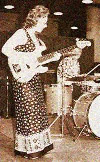 Carol on guitar